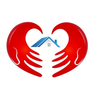 Red heart-shaped hands cradling a house, symbolizing care for home comfort and HVAC system maintenance by Boutwell's Air Masters.
